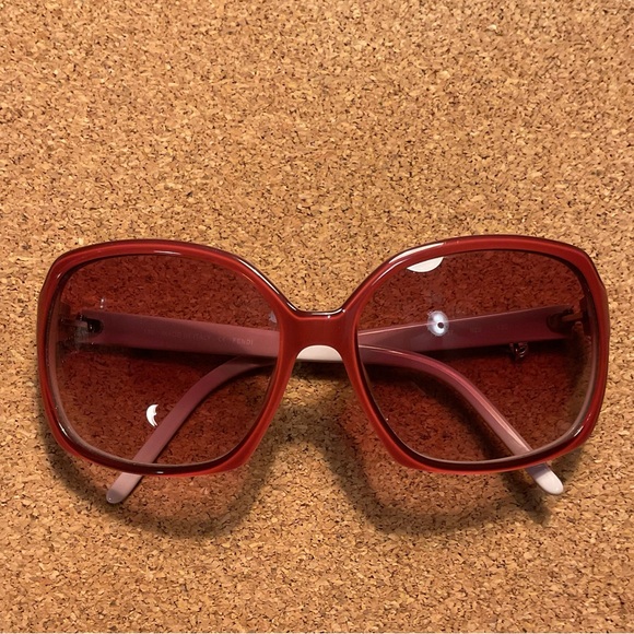 Fendi Accessories - Fendi Bold pink Sunglasses with dangling silver logo charm